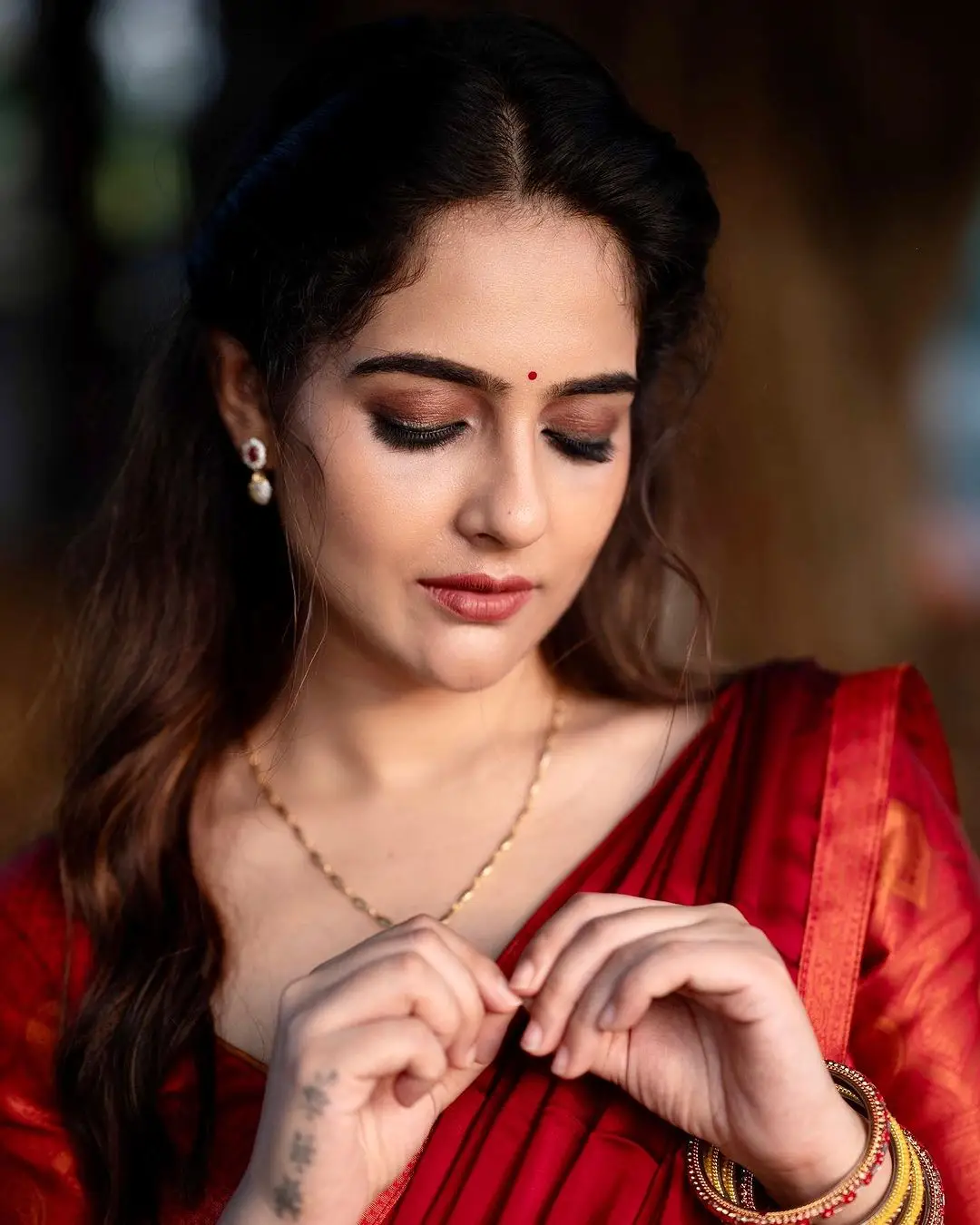 Malvi Malhotra Stills in Orange Lehenga Red Choli Maroon Voni